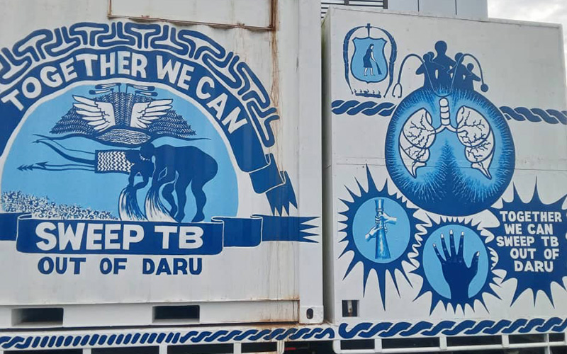 White and blue mural on the SWEEP-TB van.