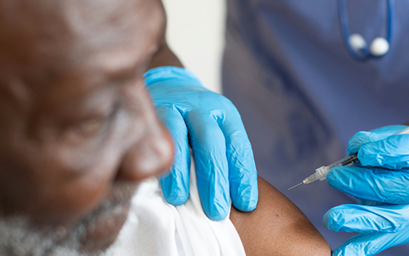 man receiving a vaccination